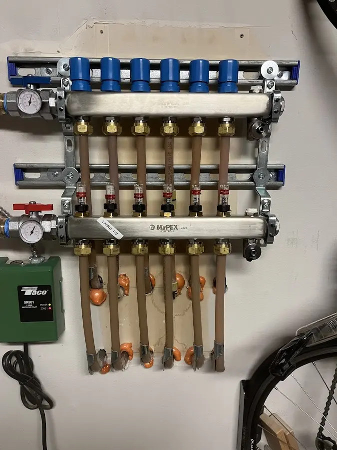 Plumber performing Sink Repair at a residential property in Olympia Heights